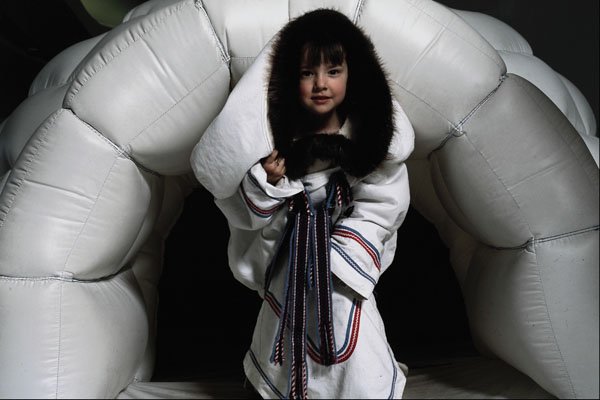 609098 A Child Experiences Inuit Life In The Children's Museum A4 Photo Print