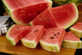 616085 Cut Watermelon On Cutting Board A4 Photo Print