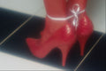 616098 Red Shoes And White Ribbon A4 Photo Print