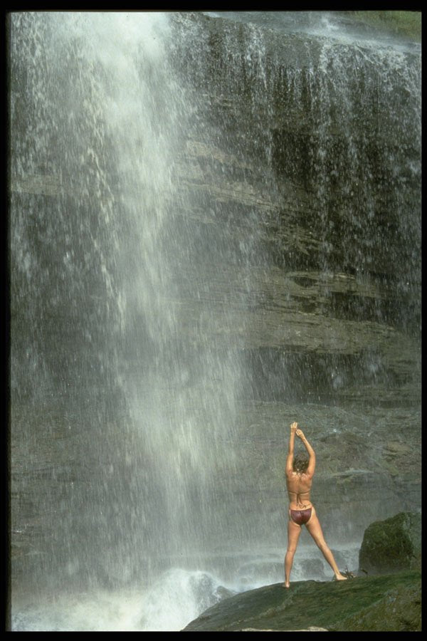 626022 Woman In Swimsuit Standing Under Waterfall A4 Photo Print