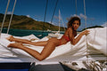 626092 Sunbathing On The Catamaran A4 Photo Print