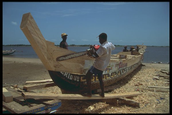 629043 Repairing Fishing Canoe, Ghana A4 Photo Print