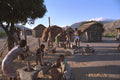 629096 Families On An Estate Pound And Grind Seed, Madagascar A4 Photo Print