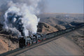 630089 Two QJs On Edge Of Gobi Desert A4 Photo Print
