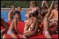 633031 Teenagers In A Swimming Pool A4 Photo Print