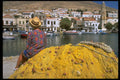 635011 Woman At Harbor, Halki, Greece A4 Photo Print