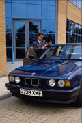 635036 Businessman With His BMW And Mobile Phone A4 Photo Print