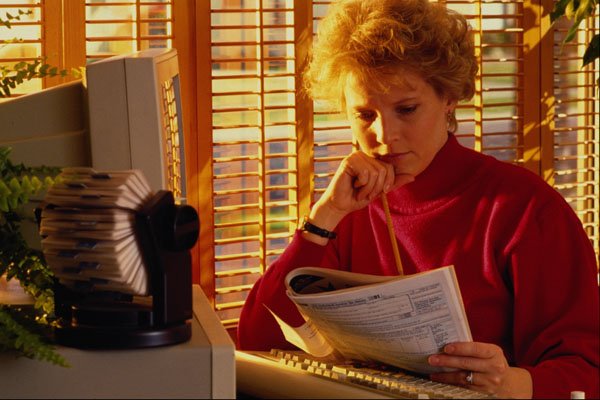 635041 Woman Working At Her Home Office A4 Photo Print