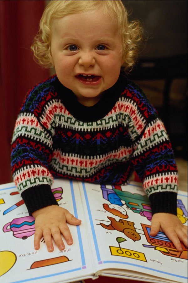 635046 Child With Book A4 Photo Print