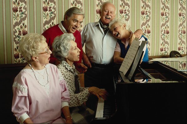635058 Retired Folks Singing Around The Piano A4 Photo Print