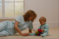 635086 Mother And Baby Playing On The Floor A4 Photo Print