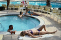 638078 Couples Around Hotel Pool In Palm Springs, California A4 Photo Print