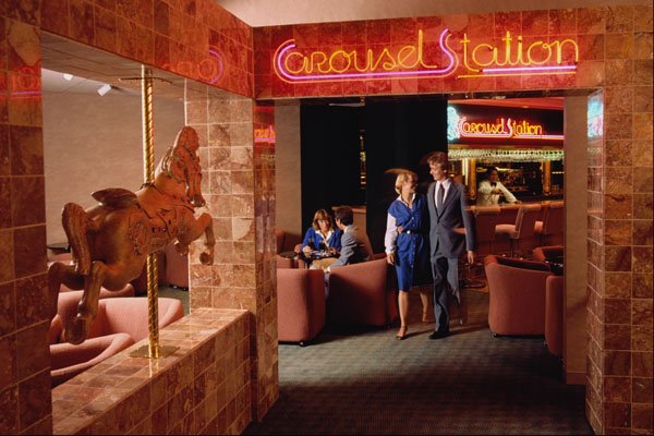638090 Couple Coming Out Of Hotel Club A4 Photo Print