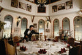 638091 Waiter Lighting Candle In Hotel Dining Room A4 Photo Print
