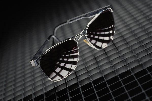 643062 Sunglasses On Grid Background A4 Photo Print