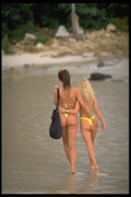 647004 Two Women Walking On The Beach A4 Photo Print