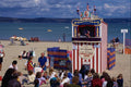 647063 Crowd Watching Punch And Judy Show A4 Photo Print