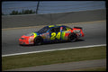 648004 A Brightly Colored Stock Car Tries To Qualify For The Race A4 Photo Print