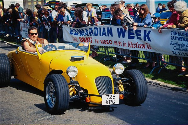 648060 725 XPG, Yellow Racing Car A4 Photo Print