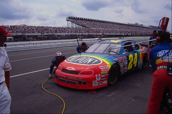 648073 The Colorful DuPont Crew Executes A Flawless Pit Stop A4 Photo Print