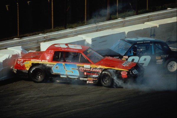 648076 Two Street Stocks Collide And Then Bounce Off The Wall A4 Photo Print