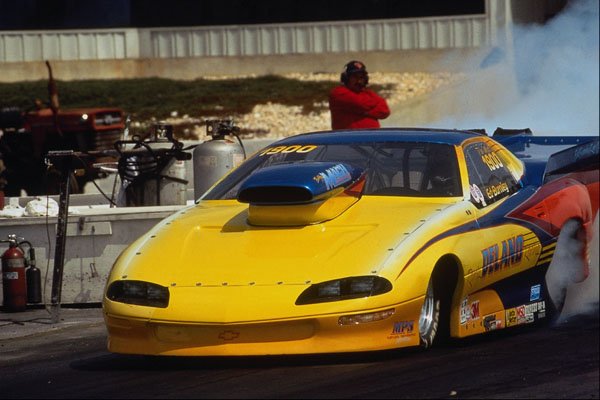 648079 A Wicked Looking Camaro Demonstrates Its Awesome Power A4 Photo Print