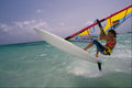 649097 Jump On Flat Water, Aruba A4 Photo Print