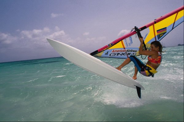 649097 Jump On Flat Water, Aruba A4 Photo Print