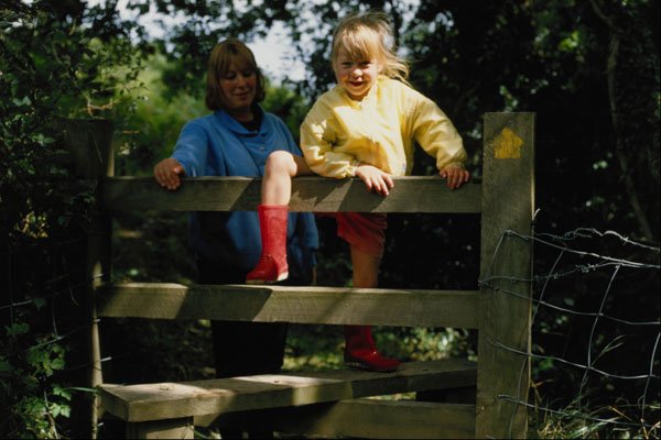 651004 Mother And Child Climbing A4 Photo Print