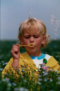 651058 Child And Bubbles A4 Photo Print
