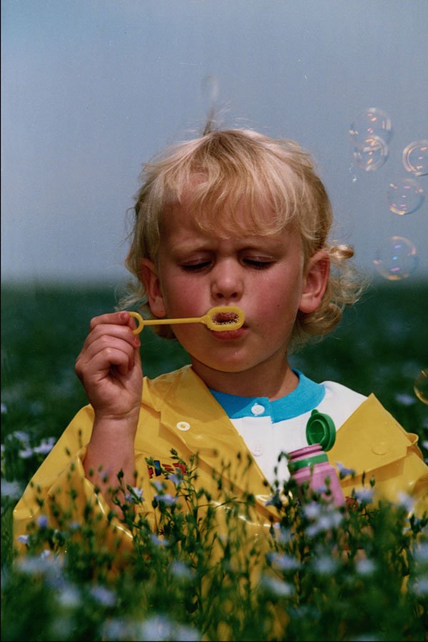 651058 Child And Bubbles A4 Photo Print