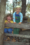 651076 Children On Fence, Laughing A4 Photo Print