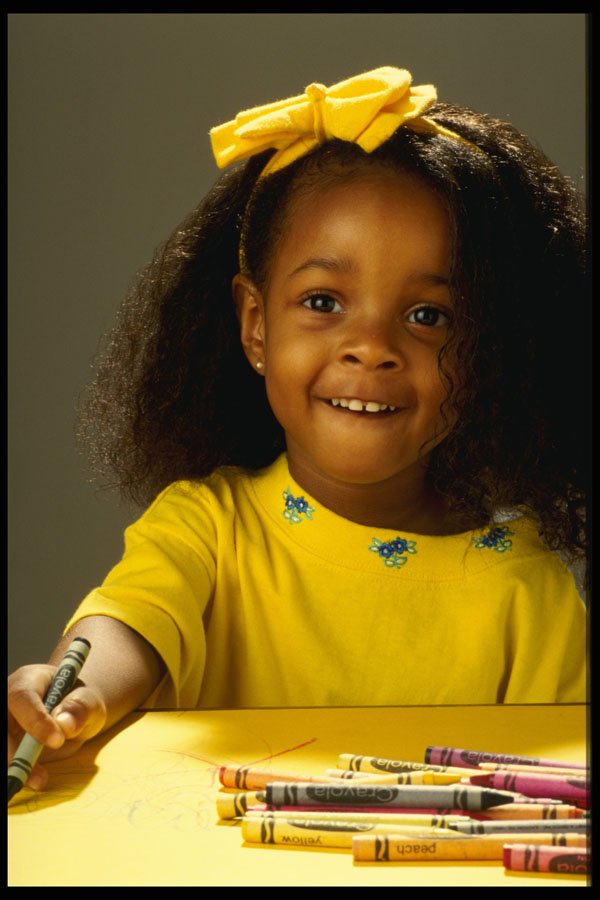 651079 Little Girl In Yellow Outfit Drawing With Crayons A4 Photo Print