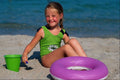 651092 Child On Beach With Plastic Ring A4 Photo Print