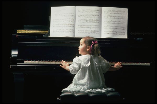 651094 Girl Playing The Piano A4 Photo Print