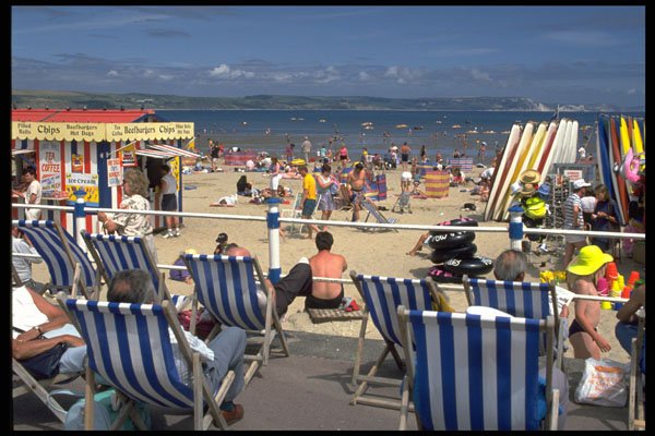 654083 Sunny Beach Shot With Deck Chairs A4 Photo Print