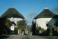 656029 Round Houses At Veryan A4 Photo Print