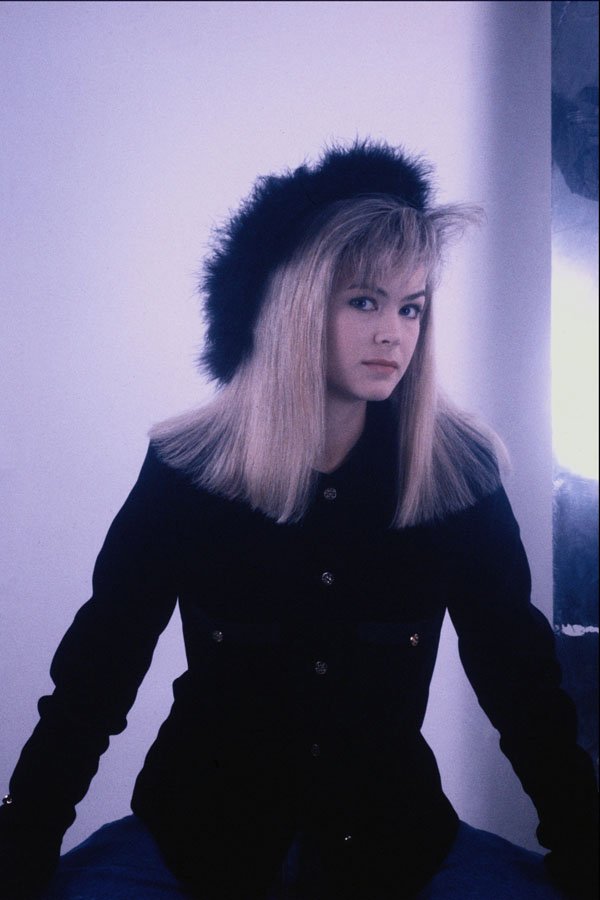 657021 Blonde Wearing Black A4 Photo Print