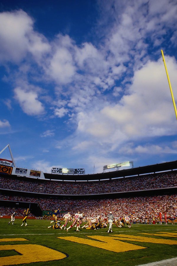 663064 Professional Football Stadium With Clouds A4 Photo Print