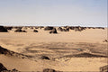 664013 Surreal Shapes In Sandstone With Land Rover, Algeria A4 Photo Print