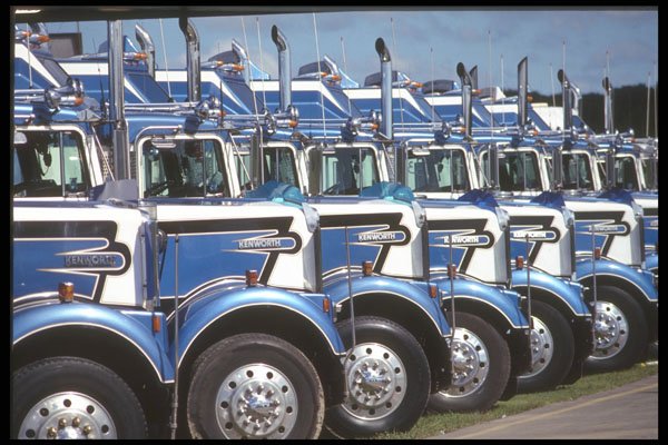 667000 Row Of Semi trucks, Side View A4 Photo Print