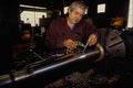 667032 Lathe Operator Checks Work In Progress, Nova Scotia A4 Photo Print