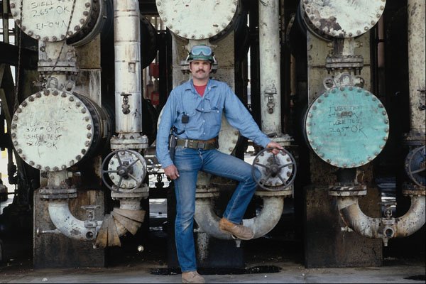 667037 Portrait Of Oil Worker A4 Photo Print