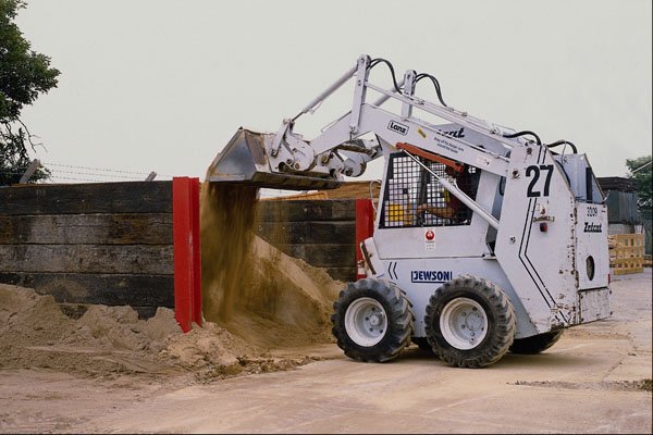 667048 Bobcat Loading Sand Into Lorry A4 Photo Print