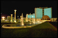 668011 Mirage Square At Night A4 Photo Print