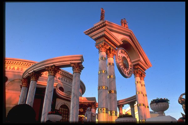 668018 Entrance To Caesar's At Dusk A4 Photo Print