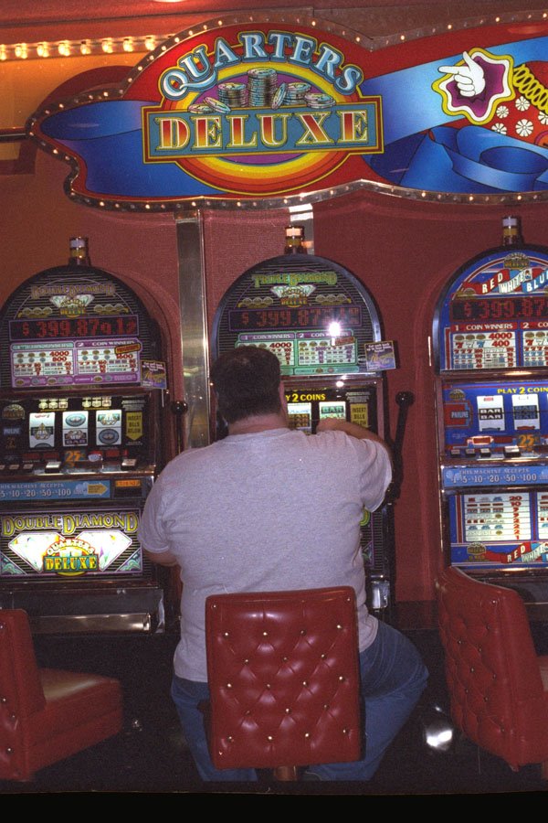 668064 Playing The Slots A4 Photo Print