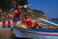 669005 Couple With Boat On Beach, Greece A4 Photo Print