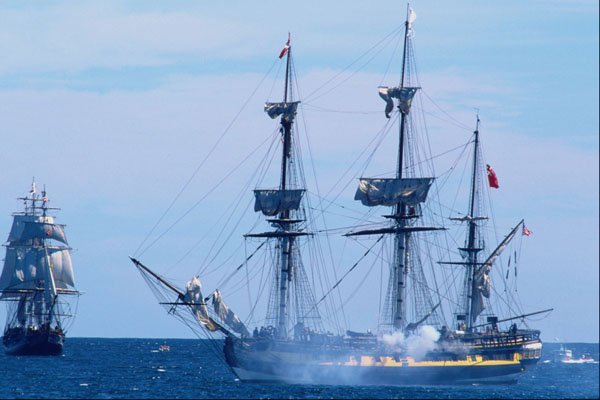 669059 HMS Rose Firing Salvo With HMS Bounty In Nova Scotia, Canada A4 Photo Print