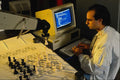 673075 Computer And Robotic Arm Playing Chess A4 Photo Print